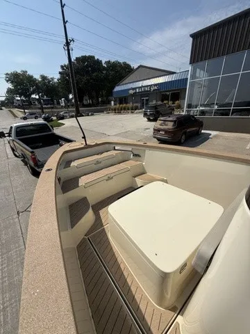 Slide: The Image of The image shows the deck of a 2023 X Shore Eelex 8000 boat on a trailer. - 16