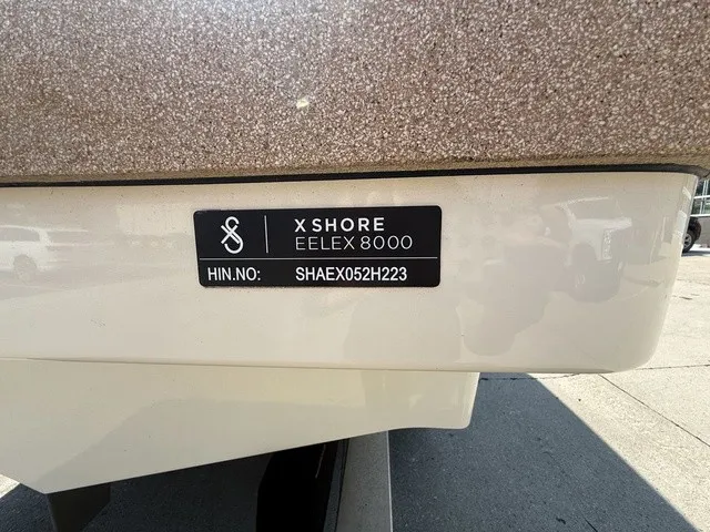 Slide: The Image of Close-up of the X Shore Eelex 8000 with serial number on the hull. - 6