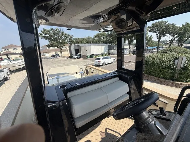 Slide: The Image of The image shows the cockpit of a 2023 X Shore Eelex 8000 with a modern helm station. - 20