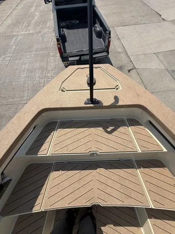 Slide: The Image of The image shows the deck of a 2023 X Shore Eelex 8000 boat with a modern design. - 21