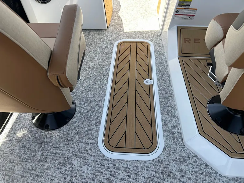 Slide: The Image of The floor of a boat with two cushioned seats and a wooden hatch in the center. - 31