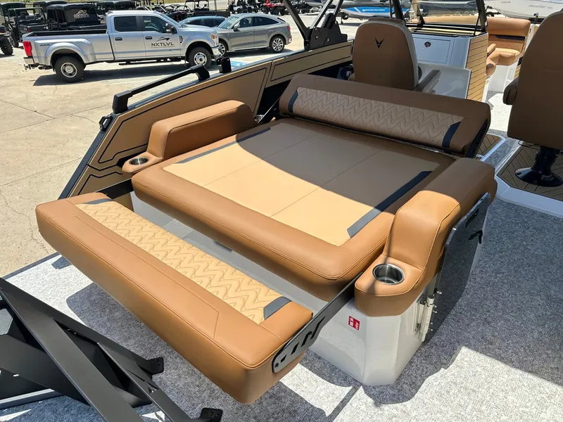 Slide: The Image of The image shows a luxurious lounging area on a boat, surrounded by beige upholstery. - 35