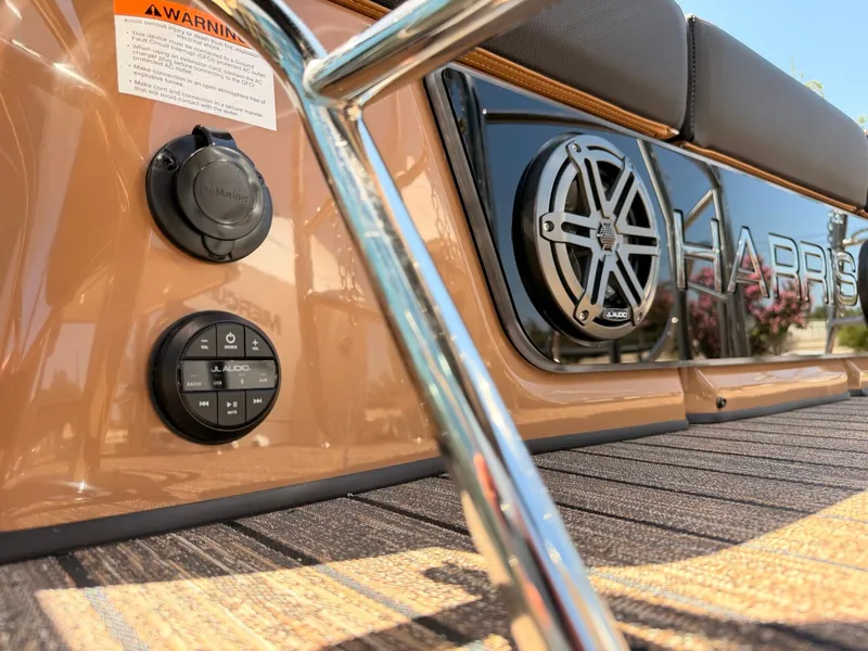 Slide: The Image of Close-up of the Harris Grand Mariner 250 with audio system and warning label. - 25