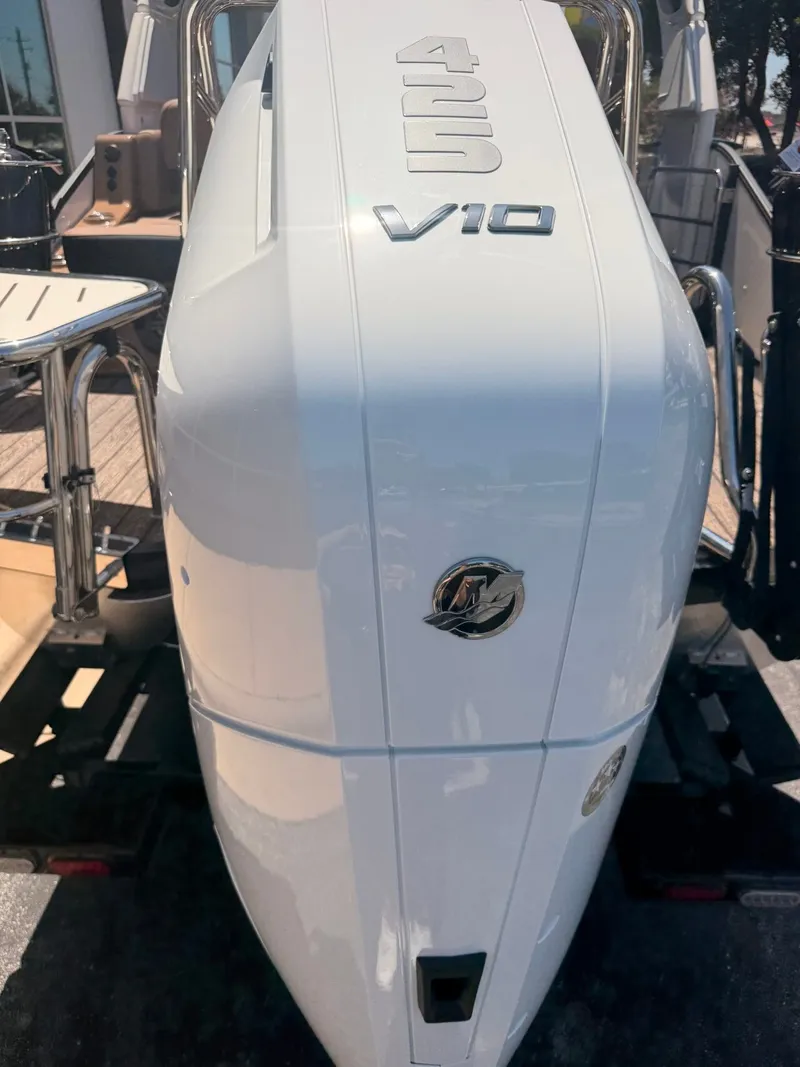 Slide: The Image of A white outboard motor labeled "V10" with a Mercury logo is visible. - 6