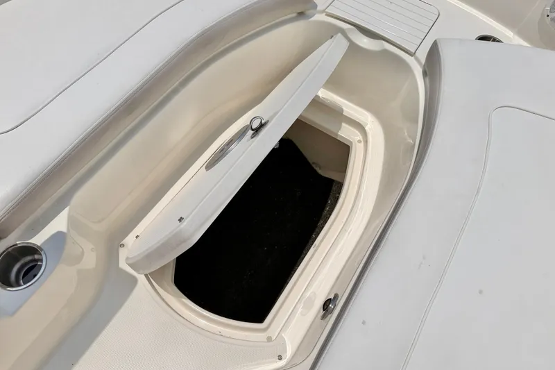 Slide: The Image of Open storage compartment on 2013 Sea Ray 260 Sundeck boat. - 30
