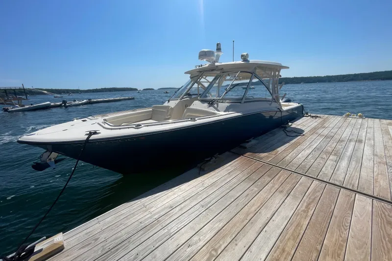 Slide: The Image of 2021 Grady-White Freedom 325 boat docked on a sunny day. - 32