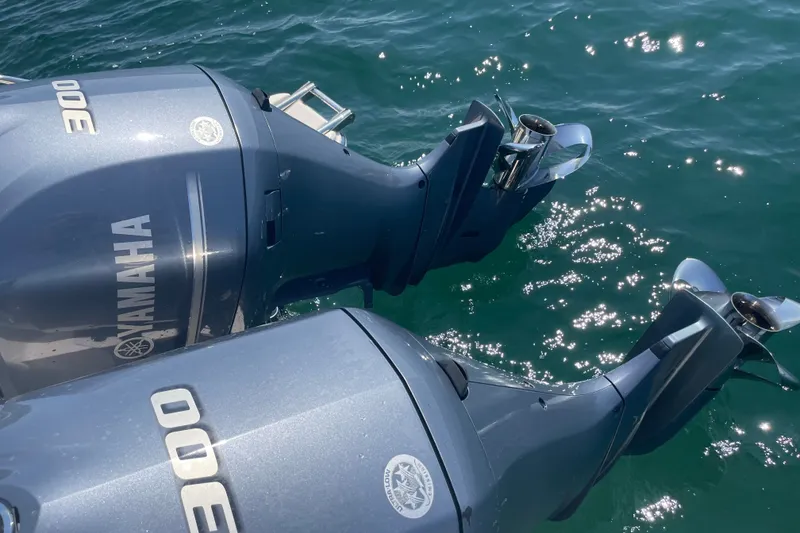 Slide: The Image of Twin Yamaha 300 outboard engines on a 2021 Grady-White Freedom 325 boat. - 24