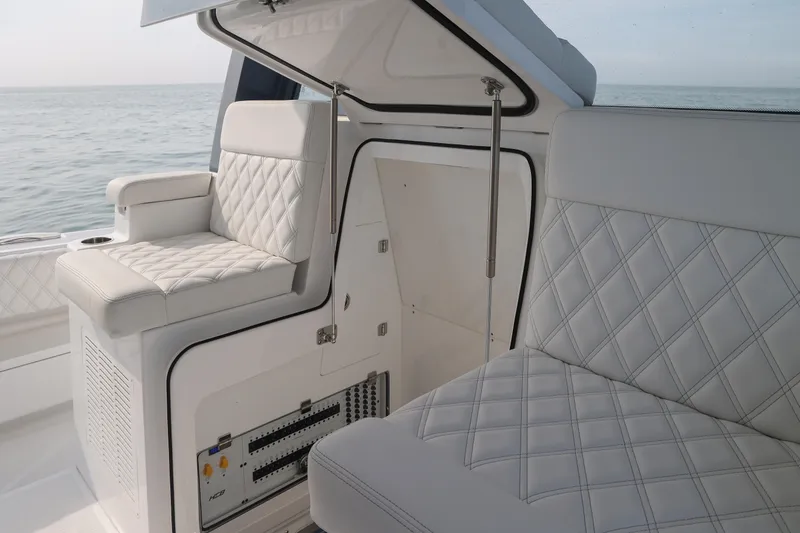 Slide: The Image of Luxurious seating on the 2027 HCB 48 Campeon boat with quilted upholstery. - 8