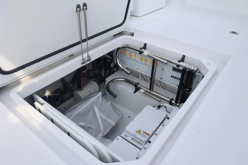 Slide: The Image of Engine compartment of 2027 HCB 48 Campeon boat, showcasing battery distribution system. - 13