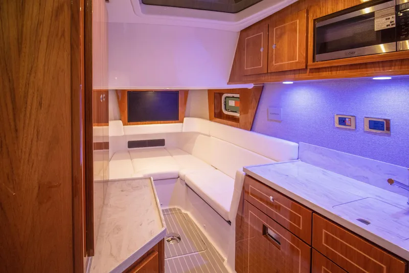 Slide: The Image of Luxurious interior of 2026 HCB 48 Campeon yacht with modern amenities and elegant design. - 19