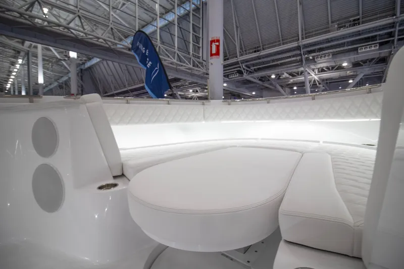 Slide: The Image of Luxurious interior of 2026 HCB 48 Campeon boat with white seating and modern design. - 17