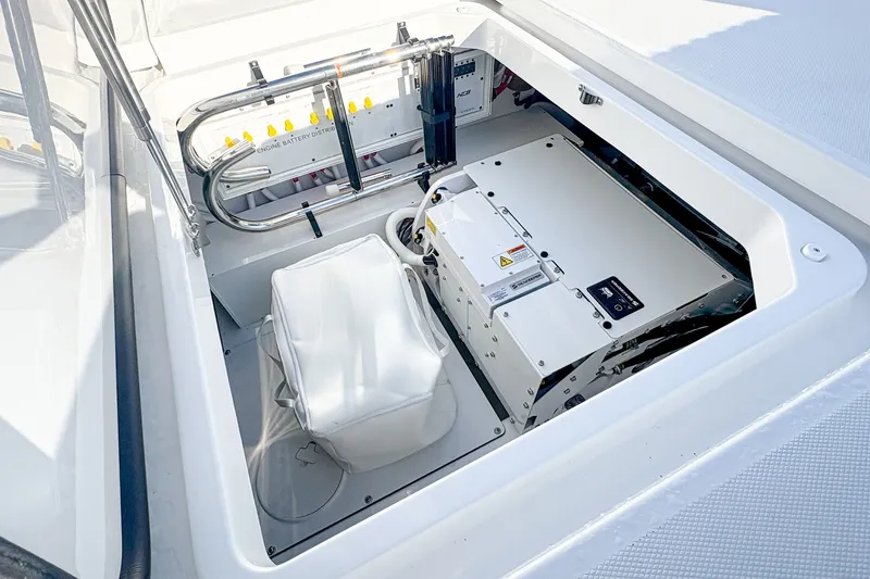Slide: The Image of Engine compartment of 2027 HCB 48 Campeon boat, showcasing battery distribution system. - 26