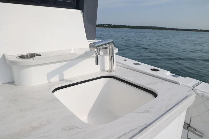Slide: The Image of Luxury sink on 2027 HCB 48 Campeon boat with ocean view. - 9