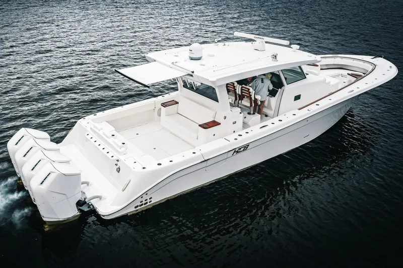 Slide: The Image of HCB 48 Campeon 2027 boat on water, featuring sleek design and powerful engines. - 6