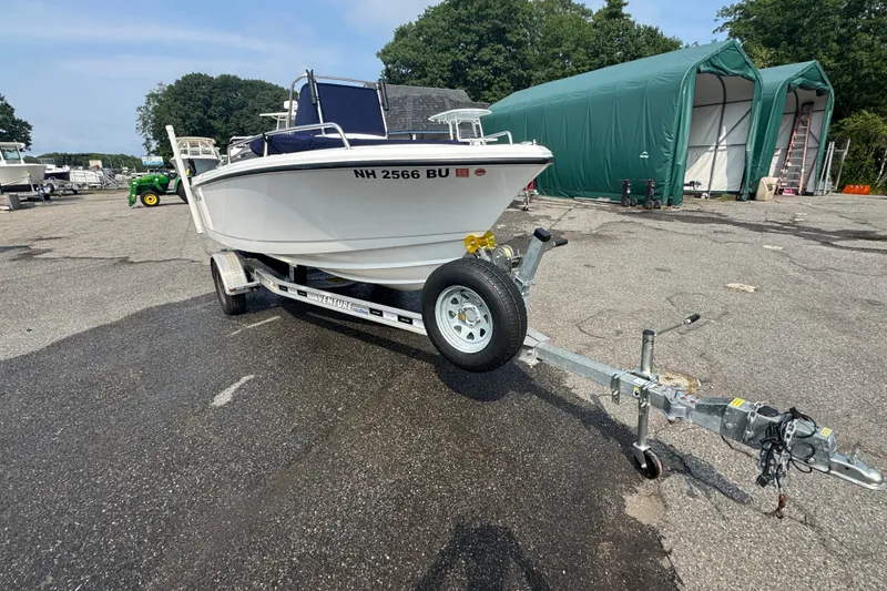 Slide: The Image of 2020 Edgewater 170CC boat on trailer in outdoor storage area. - 3