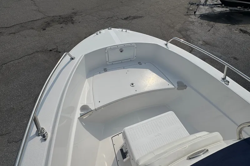Slide: The Image of 2020 Edgewater 170CC boat interior with seating and storage compartments. - 9