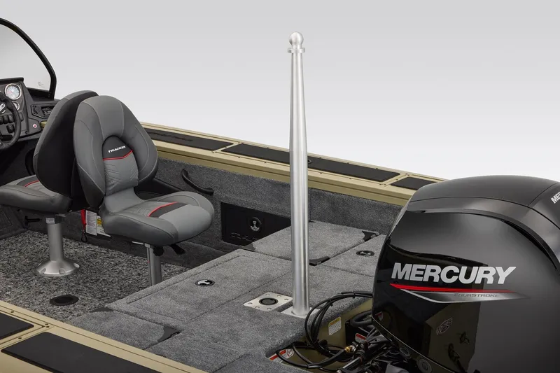 Slide: The Image of 2027 Tracker Targa V-18 Combo boat interior with Mercury engine and seating. - 7