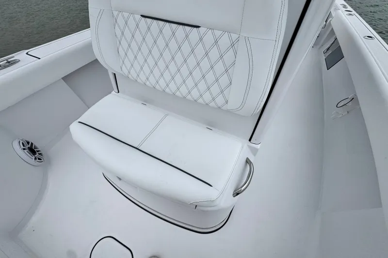 Slide: The Image of Luxurious seating on 2027 Sportsman Masters 267 Bay Boat with diamond-stitched upholstery. - 13