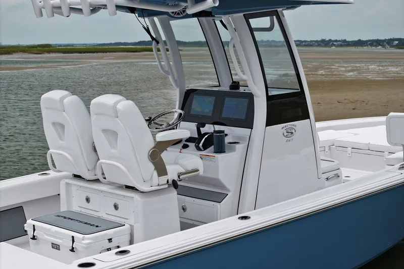 Slide: The Image of 2027 Sportsman Masters 267 Bay Boat with dual seats and advanced navigation system. - 6