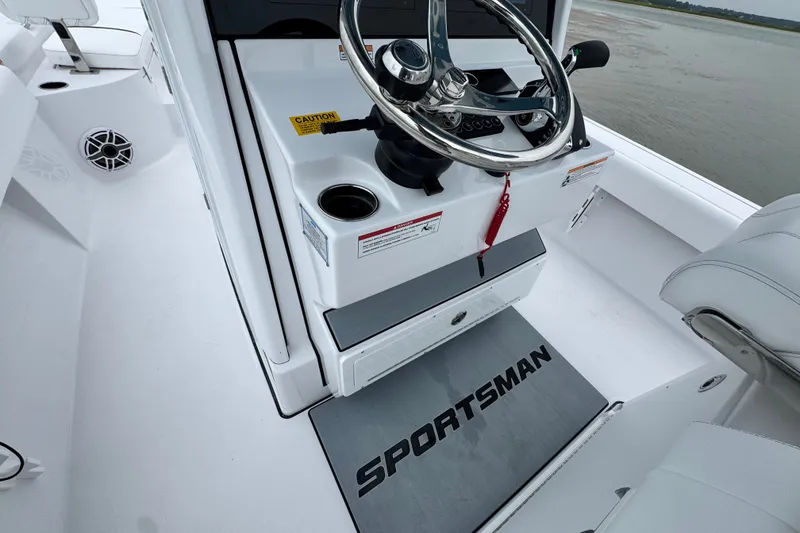 Slide: The Image of Steering console of 2027 Sportsman Masters 267 Bay Boat with sleek design and controls. - 19