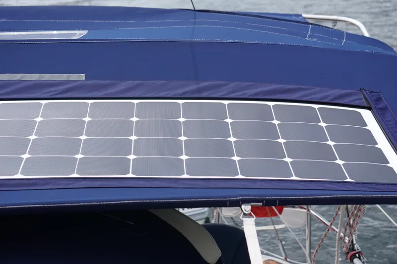 Slide: The Image of Solar panel on Jeanneau Sun Odyssey 37 sailboat, 2004 model, with blue canvas cover. - 16