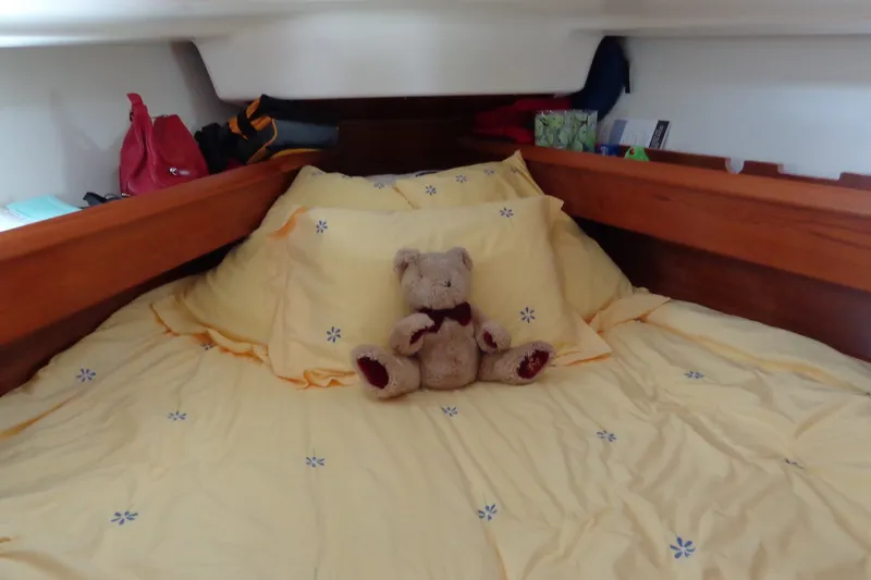 Slide: The Image of Cozy cabin bed with teddy bear on Jeanneau Sun Odyssey 37, 2004 model. - 22
