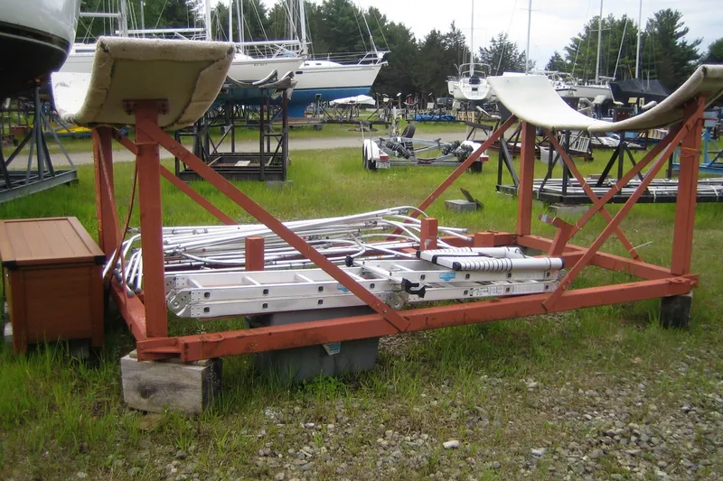 Slide: The Image of Boat cradle for Jeanneau Sun Odyssey 37, 2004 model, in a boatyard setting. - 36
