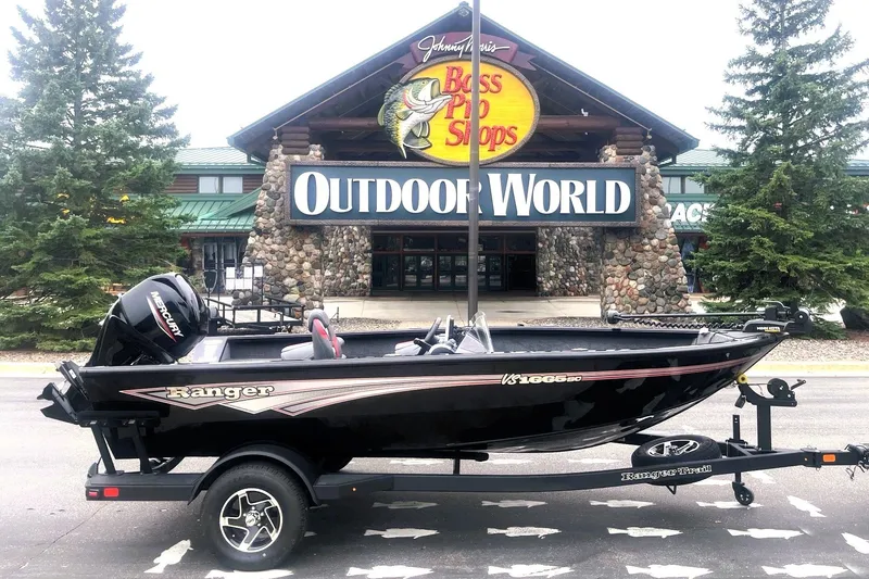The Image of 2026 Ranger VS1665SC boat on trailer outside Bass Pro Shops Outdoor World. - 0