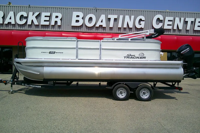 Slide: The Image of 2026 Sun Tracker Party Barge 20 DLX pontoon boat at dealership. - 89