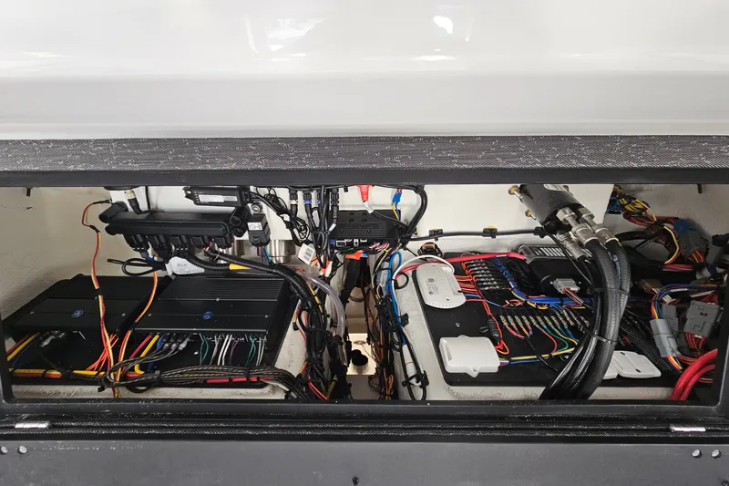 Slide: The Image of Engine compartment of 2026 Monterey Elite 30 OB, showcasing wiring and components. - 33