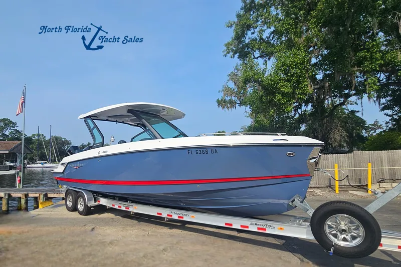 The Image of 2026 Monterey Elite 30 OB boat on trailer at North Florida Yacht Sales. - 1