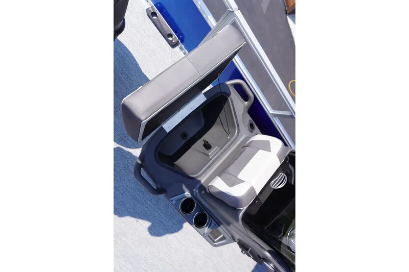 Slide: The Image of 2027 Sun Tracker Bass Buggy 16 DLX boat seat and storage compartment detail. - 7
