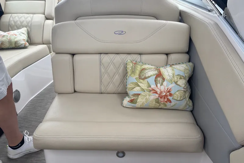 Slide: The Image of Beige leather seating with floral cushion on 2019 Regal 28 Express boat. - 16