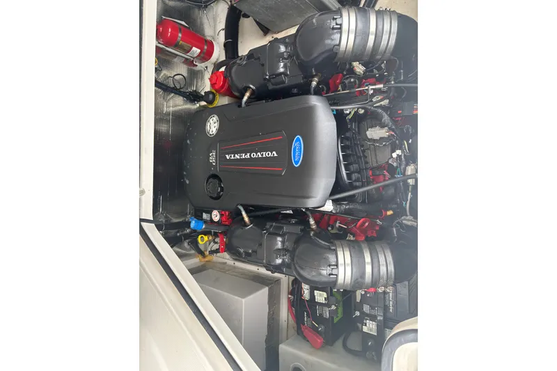 Slide: The Image of Engine compartment of a 2019 Regal 28 Express with Volvo Penta engine. - 47