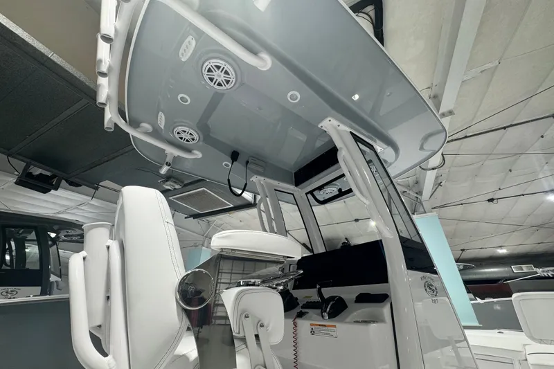 Slide: The Image of 2027 Sportsman Masters 227 Bay Boat interior with modern helm and seating. - 3