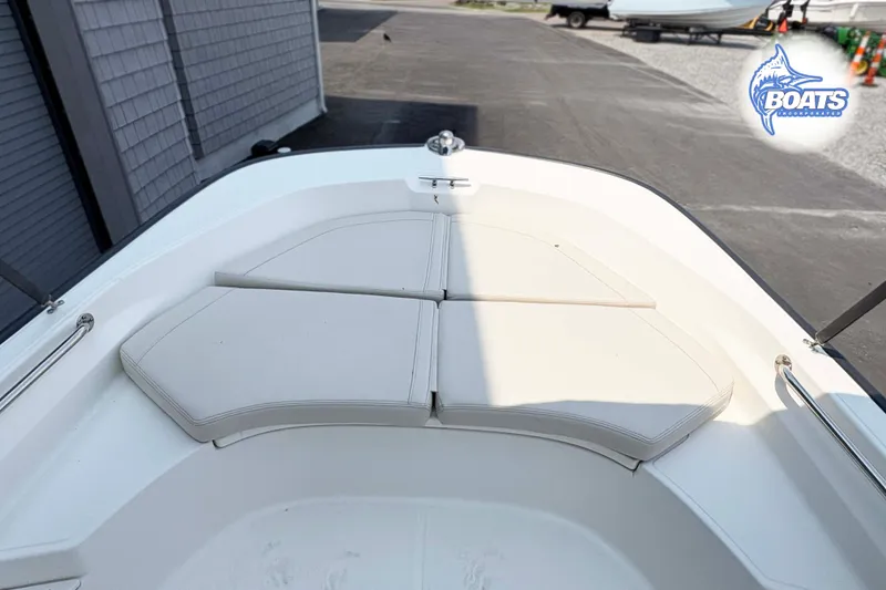 Slide: The Image of 2018 Boston Whaler 170 Montauk boat interior with cushioned seating. - 4