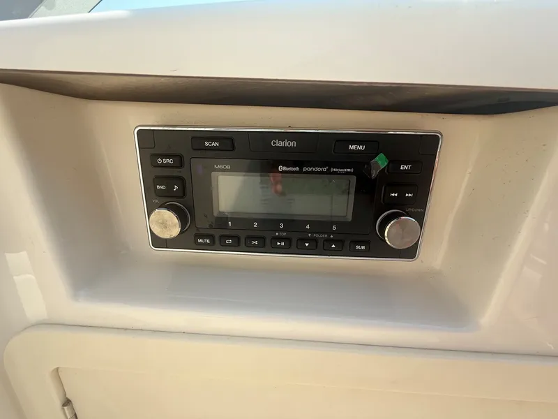 Slide: The Image of A Clarion audio system is installed in the dashboard of a 2011 Chaparral 244 Sunesta. - 22