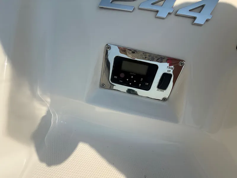 Slide: The Image of Close-up of a control panel on a 2011 Chaparral 244 Sunesta boat. - 34