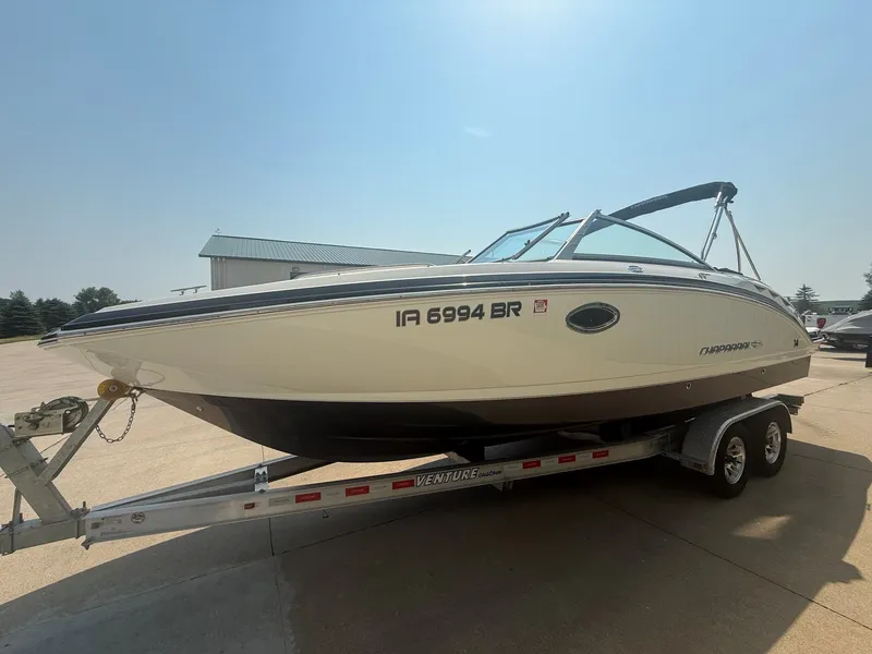 Slide: The Image of A 2011 Chaparral 244 Sunesta boat on a trailer, ready for transport. - 3