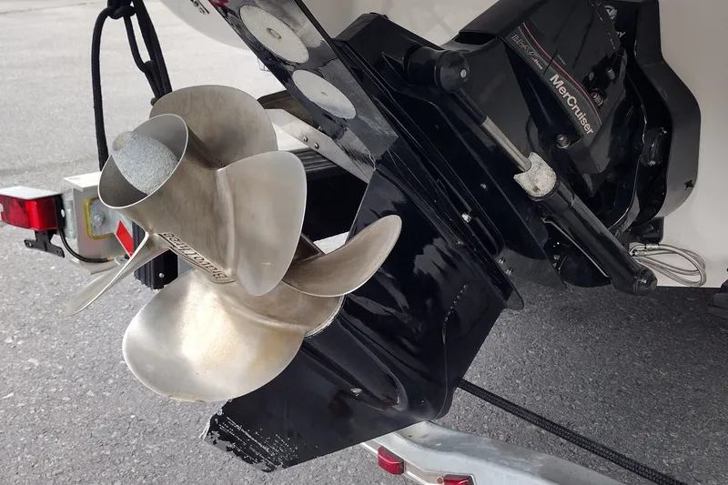 Slide: The Image of Close-up of a 2006 Doral Monticello 250 boat propeller and MerCruiser outdrive. - 11