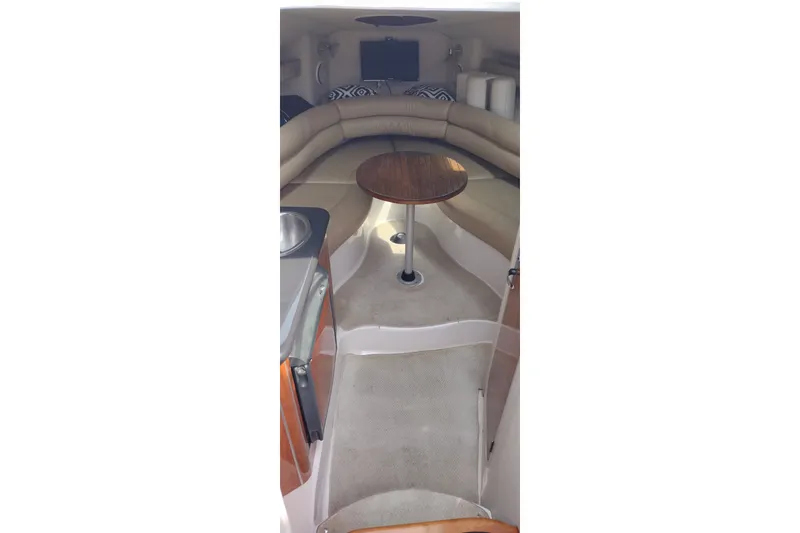 Slide: The Image of Interior of 2006 Doral Monticello 250 boat with seating and table. - 19