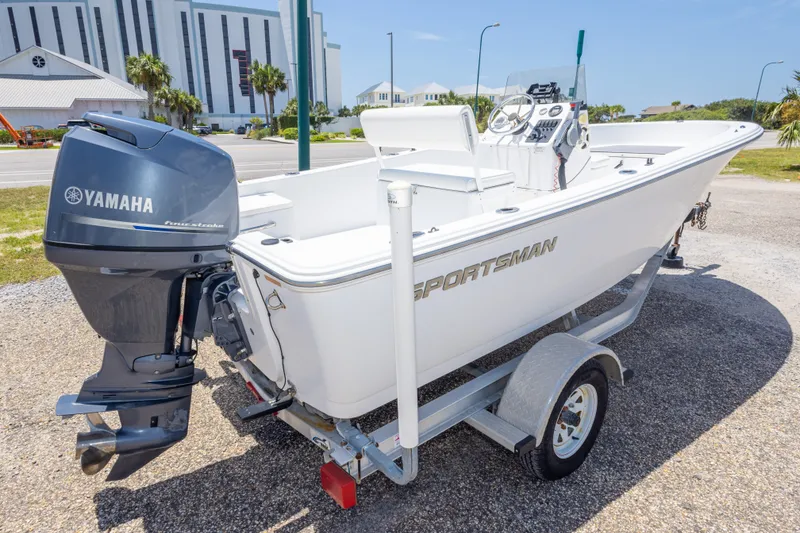 Slide: The Image of 2015 Sportsman Island Reef 17 Center Console boat with Yamaha engine on trailer. - 14