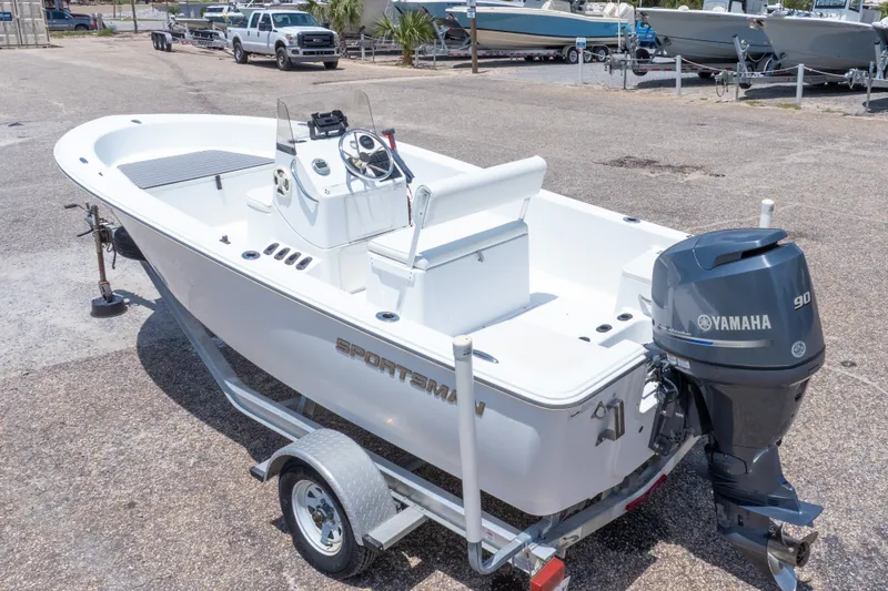 Slide: The Image of 2015 Sportsman Island Reef 17 Center Console boat with Yamaha 90 engine on trailer. - 39