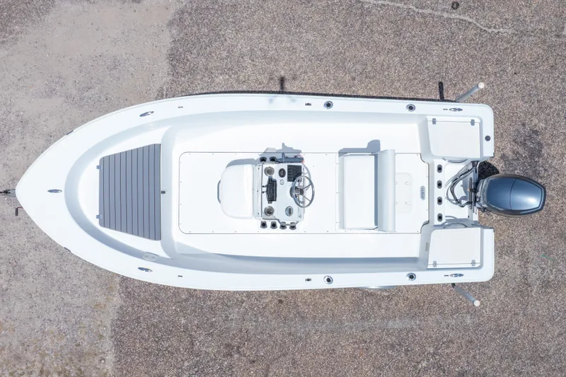 Slide: The Image of Overhead view of a 2015 Sportsman Island Reef 17 Center Console boat on land. - 6