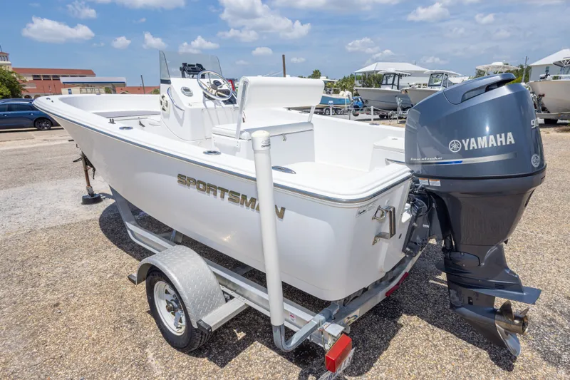 Slide: The Image of 2015 Sportsman Island Reef 17 Center Console boat with Yamaha engine on trailer. - 16