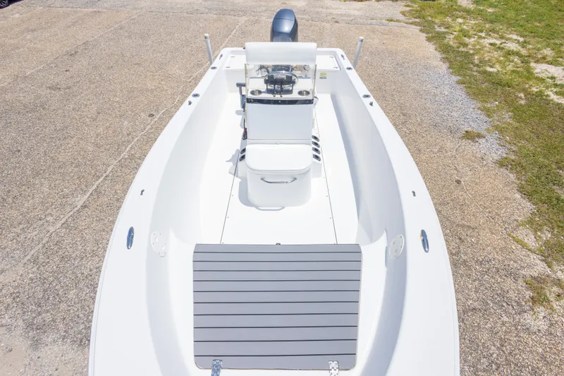 Slide: The Image of 2015 Sportsman Island Reef 17 Center Console boat on a concrete surface. - 25