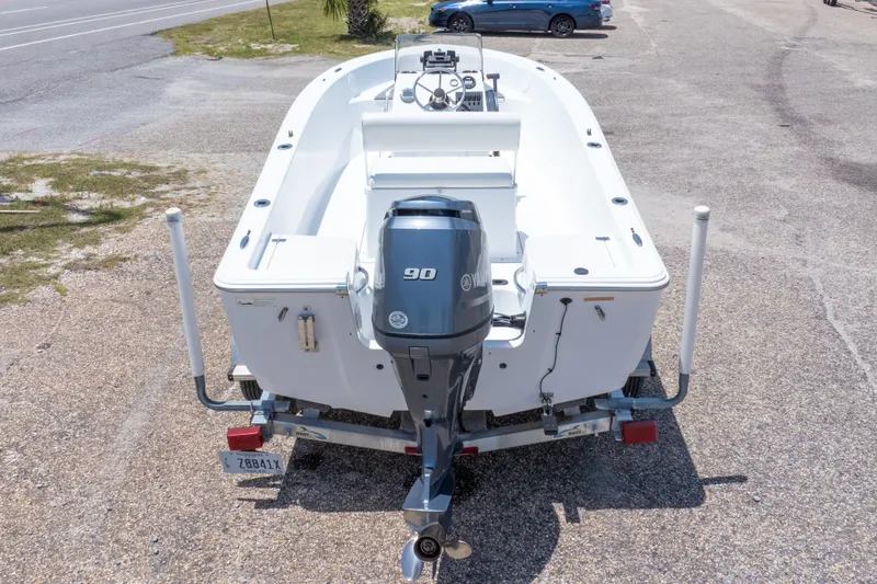 Slide: The Image of 2015 Sportsman Island Reef 17 Center Console boat with Yamaha 90 engine on trailer. - 38