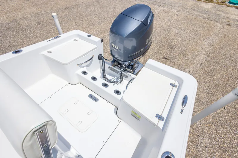 Slide: The Image of 2015 Sportsman Island Reef 17 Center Console boat with Yamaha outboard motor. - 31