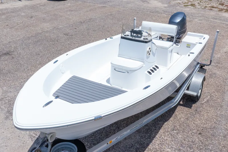 Slide: The Image of 2015 Sportsman Island Reef 17 Center Console boat on trailer, top view. - 4