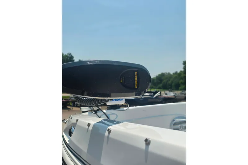 Slide: The Image of 2021 Tahoe 550 TF boat with PowerDrive motor, sunny day, outdoor setting. - 8